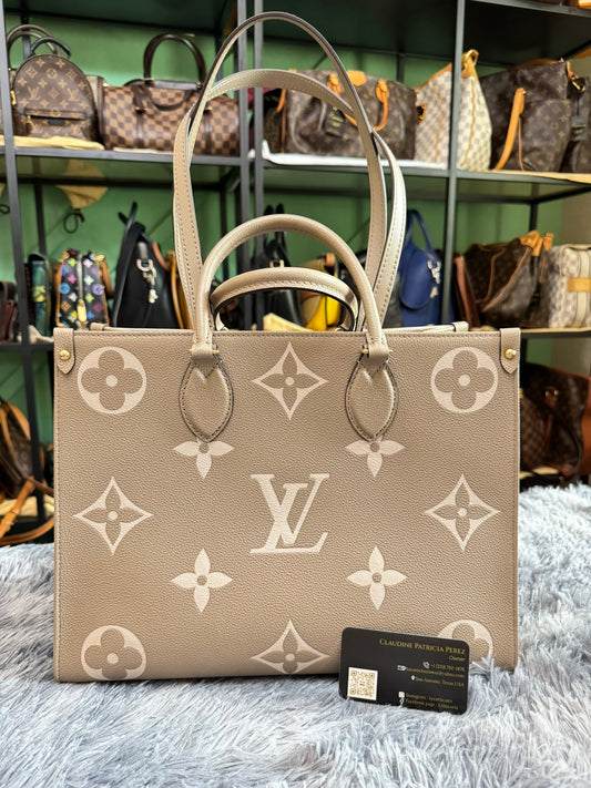 Louis Vuitton OnTheGo MM in Bicolor Monogram Empreinte Leather (Tourterelle/Cream)
