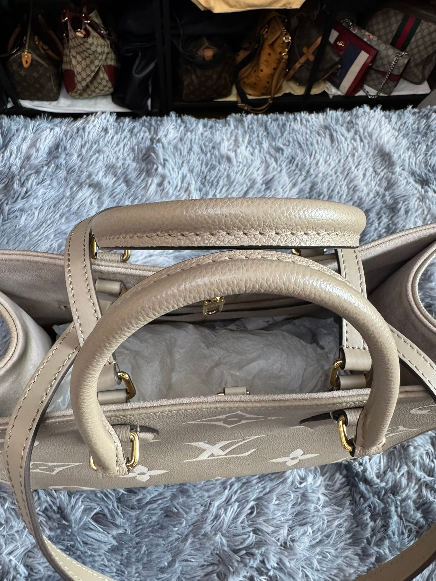 Louis Vuitton OnTheGo MM in Bicolor Monogram Empreinte Leather (Tourterelle/Cream)