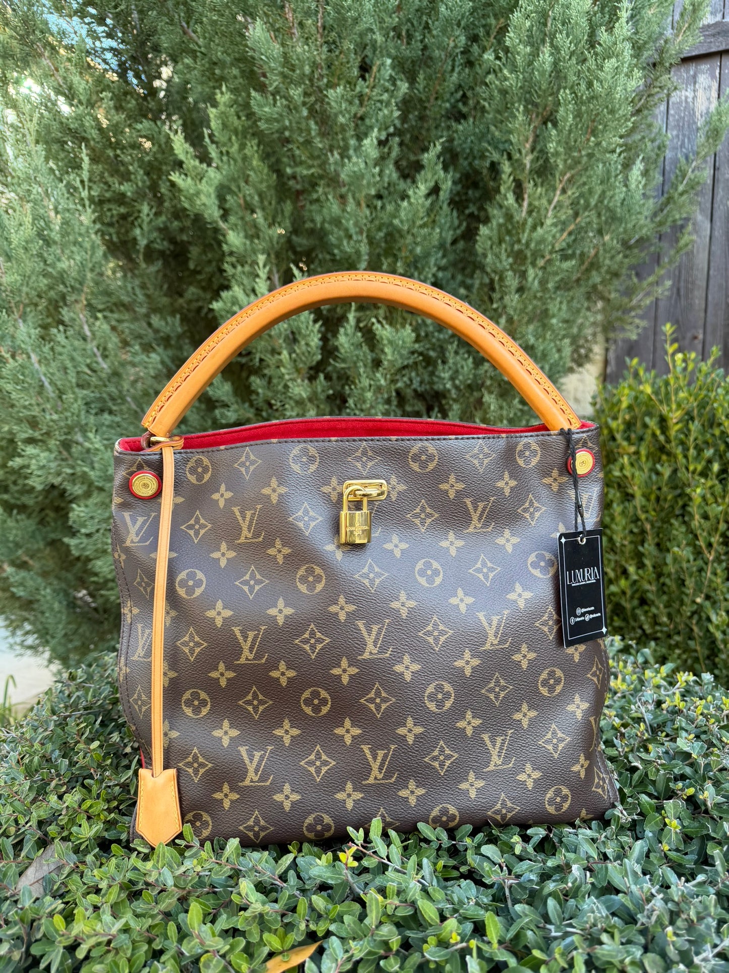 Louis Vuitton Gaia in Monogram Canvas with Red Accent