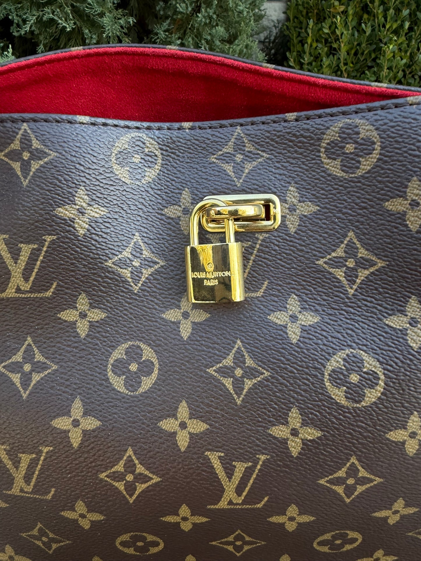 Louis Vuitton Gaia in Monogram Canvas with Red Accent