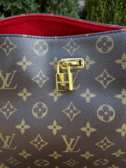 Louis Vuitton Gaia in Monogram Canvas with Red Accent