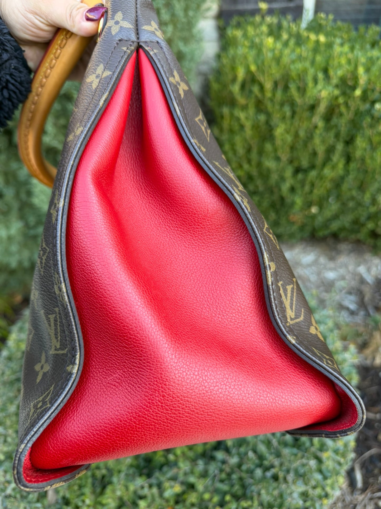 Louis Vuitton Gaia in Monogram Canvas with Red Accent