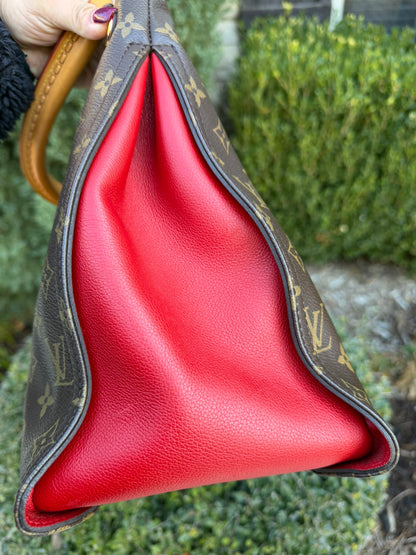 Louis Vuitton Gaia in Monogram Canvas with Red Accent