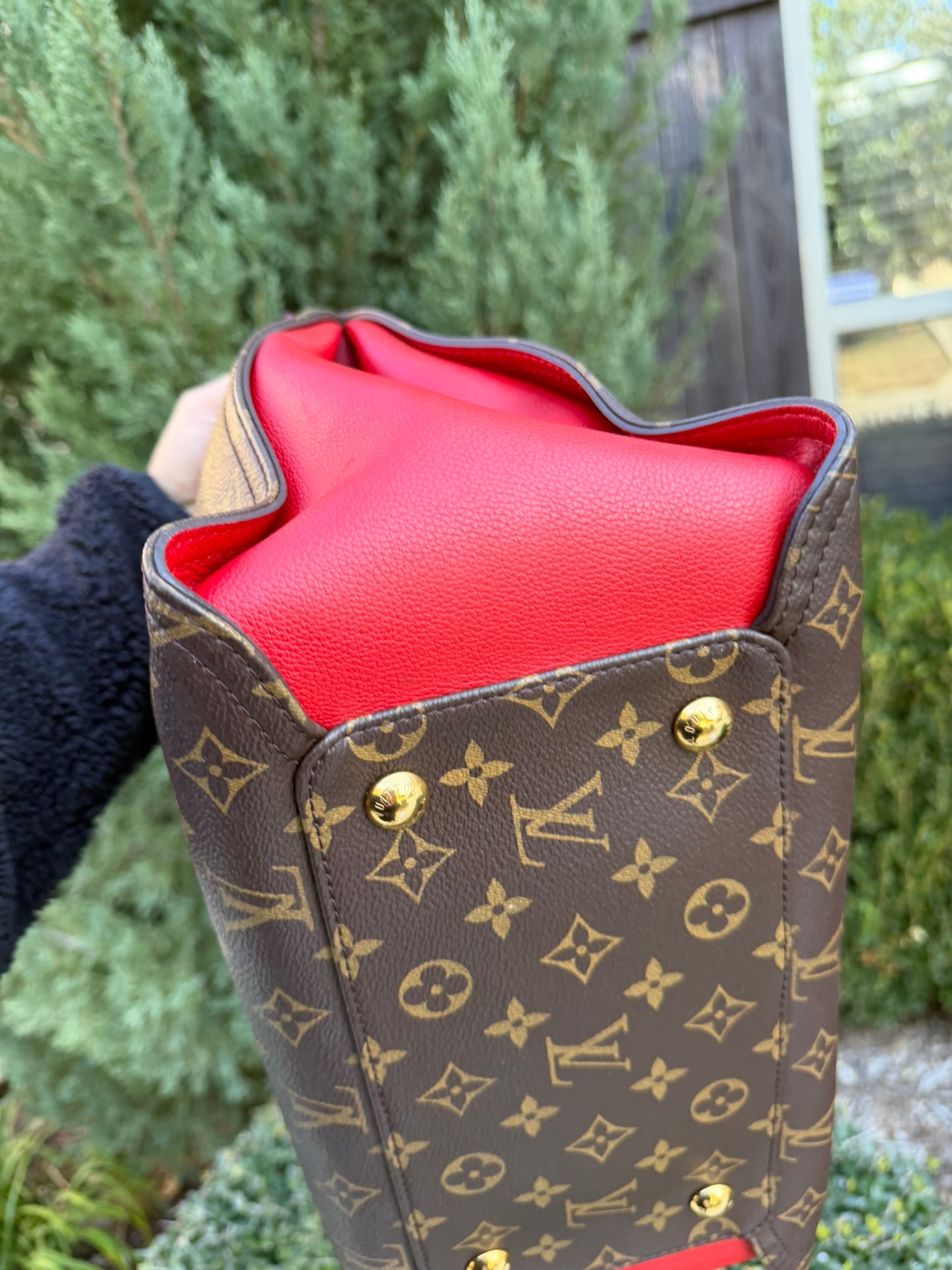 Louis Vuitton Gaia in Monogram Canvas with Red Accent