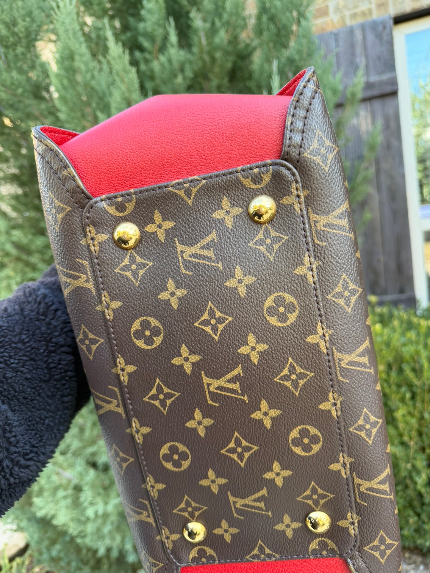 Louis Vuitton Gaia in Monogram Canvas with Red Accent