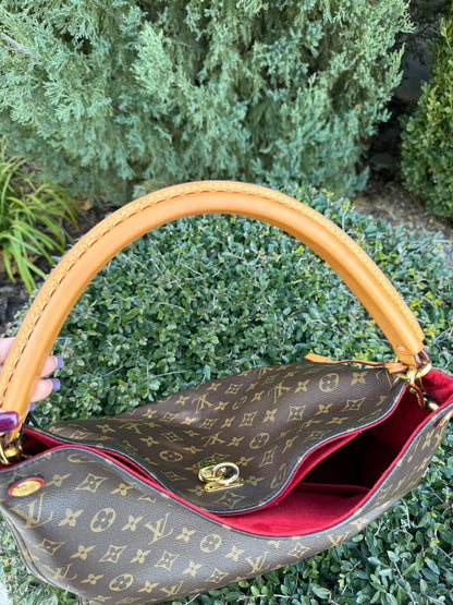 Louis Vuitton Gaia in Monogram Canvas with Red Accent