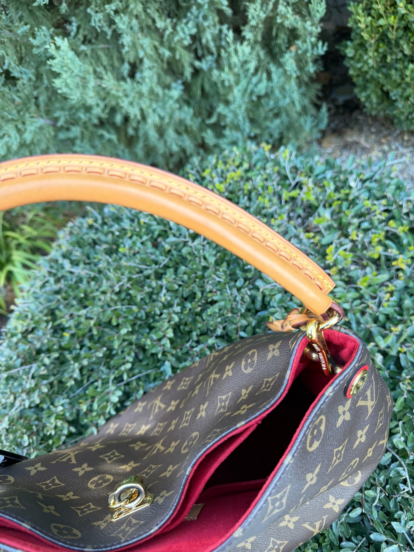 Louis Vuitton Gaia in Monogram Canvas with Red Accent