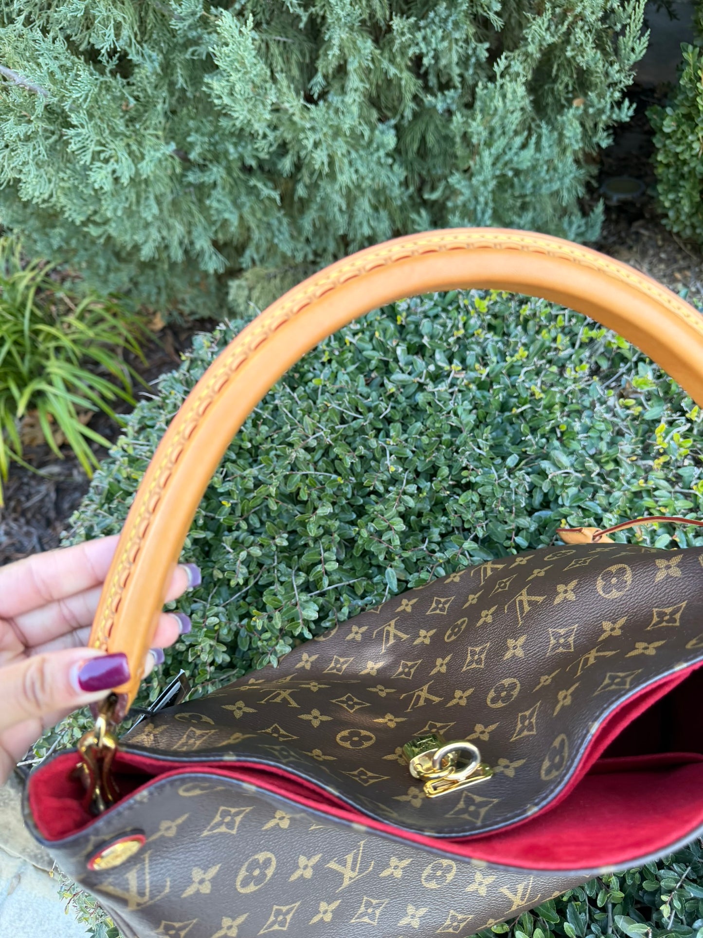 Louis Vuitton Gaia in Monogram Canvas with Red Accent