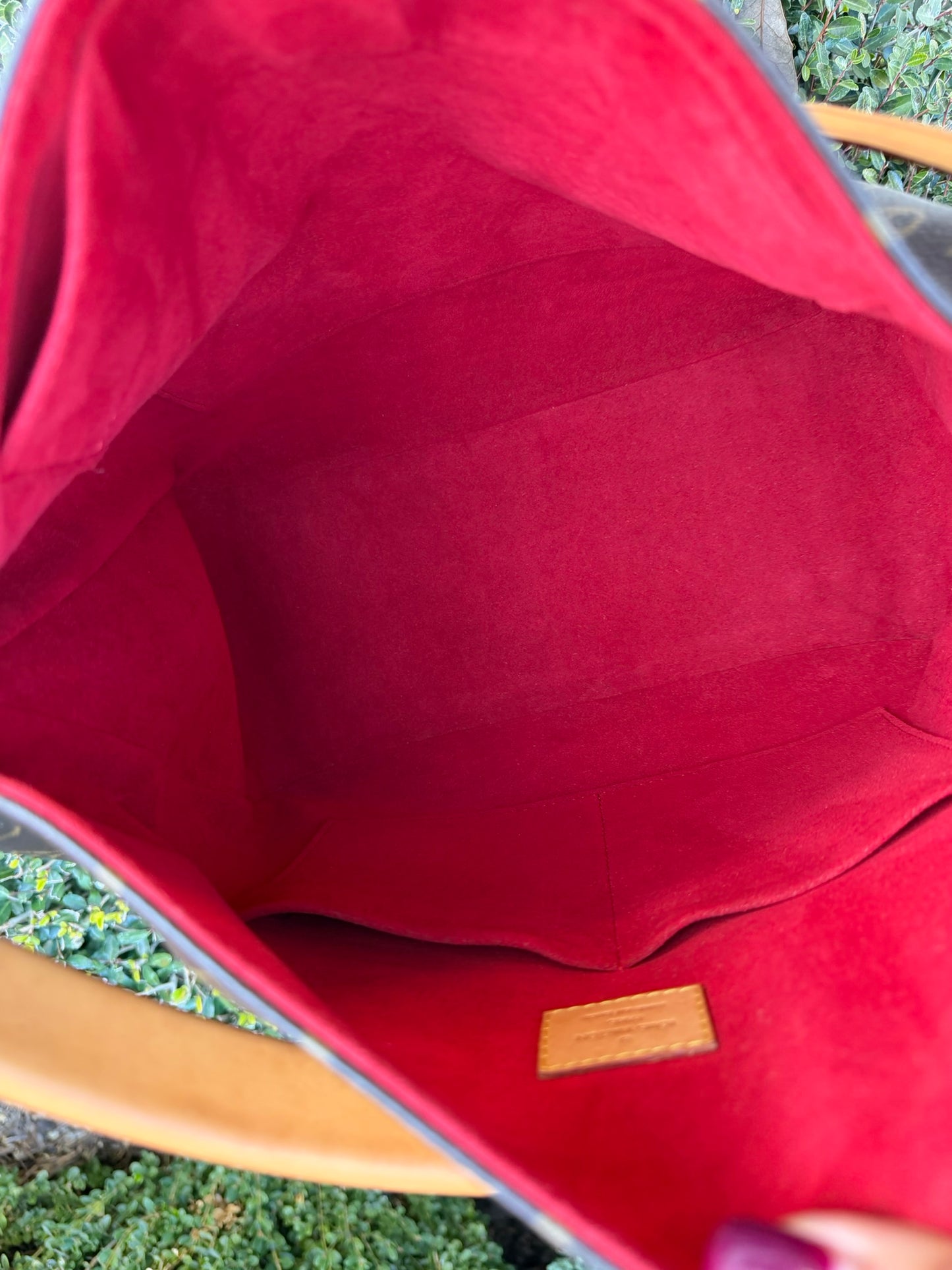 Louis Vuitton Gaia in Monogram Canvas with Red Accent