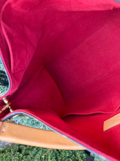 Louis Vuitton Gaia in Monogram Canvas with Red Accent