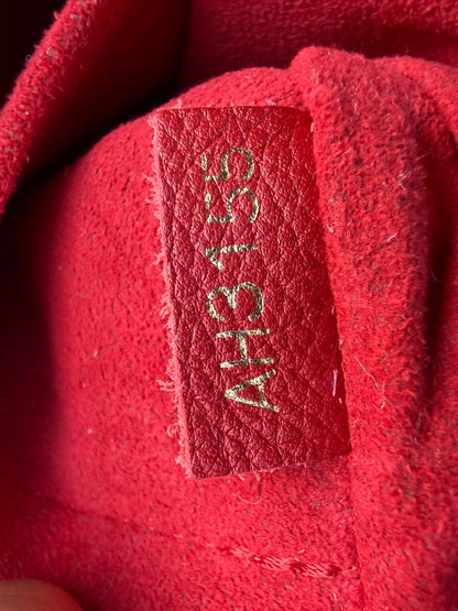 Louis Vuitton Gaia in Monogram Canvas with Red Accent