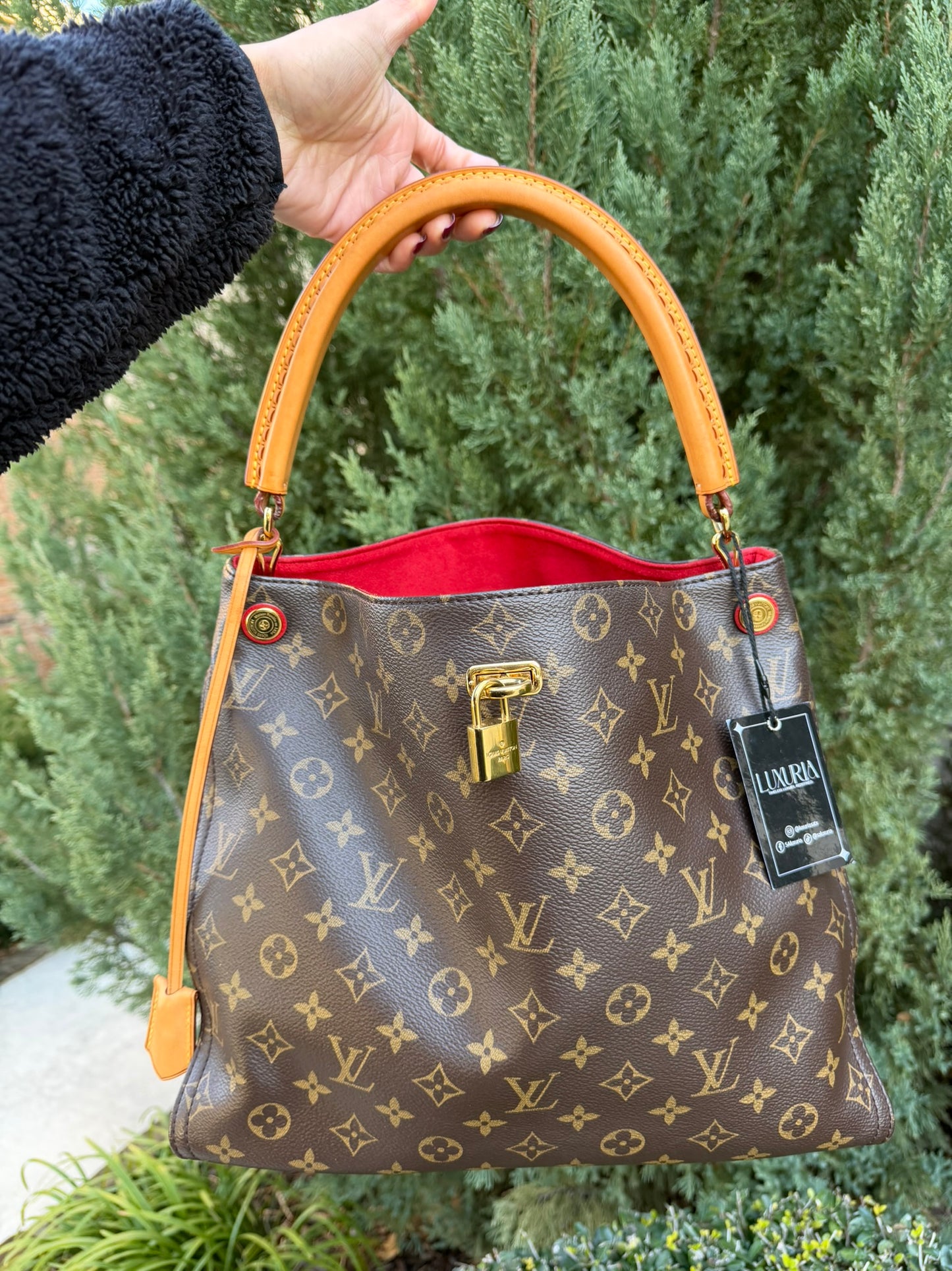 Louis Vuitton Gaia in Monogram Canvas with Red Accent
