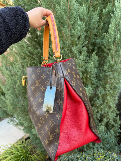Louis Vuitton Gaia in Monogram Canvas with Red Accent