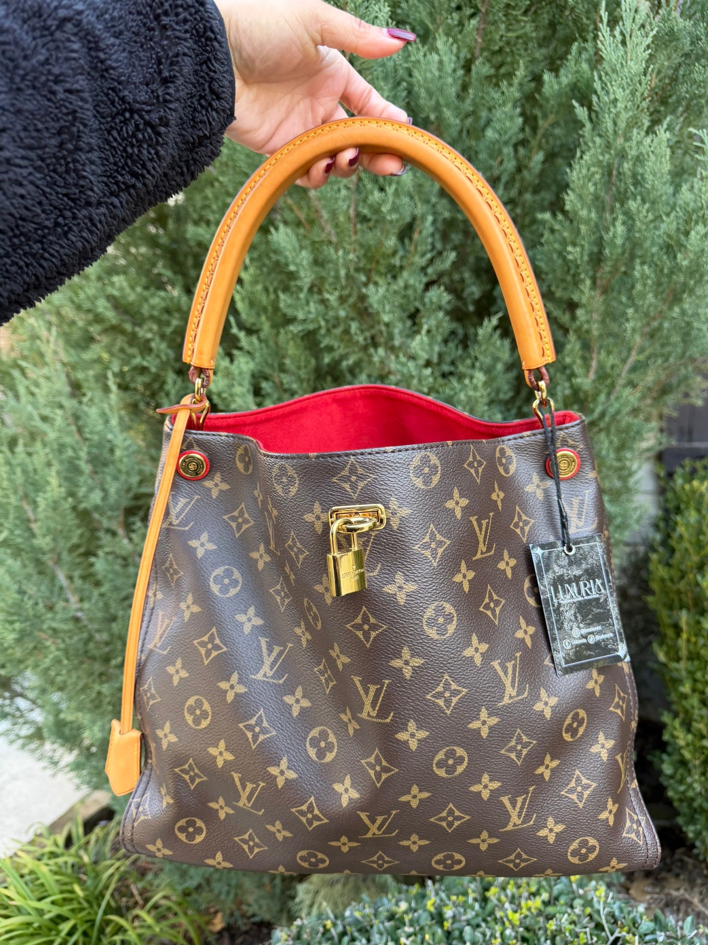 Louis Vuitton Gaia in Monogram Canvas with Red Accent