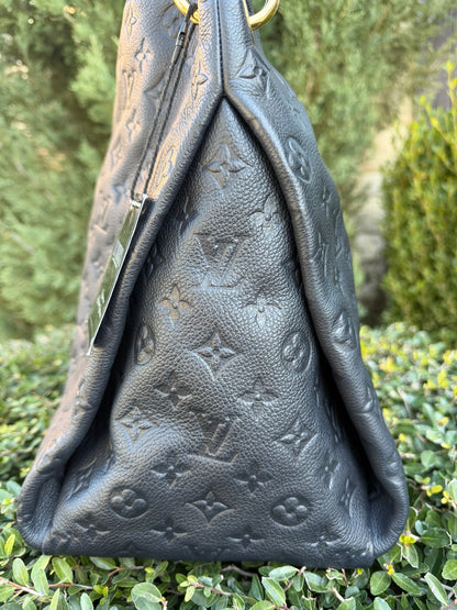 Louis Vuitton Artsy MM in Infini Empreinte Leather