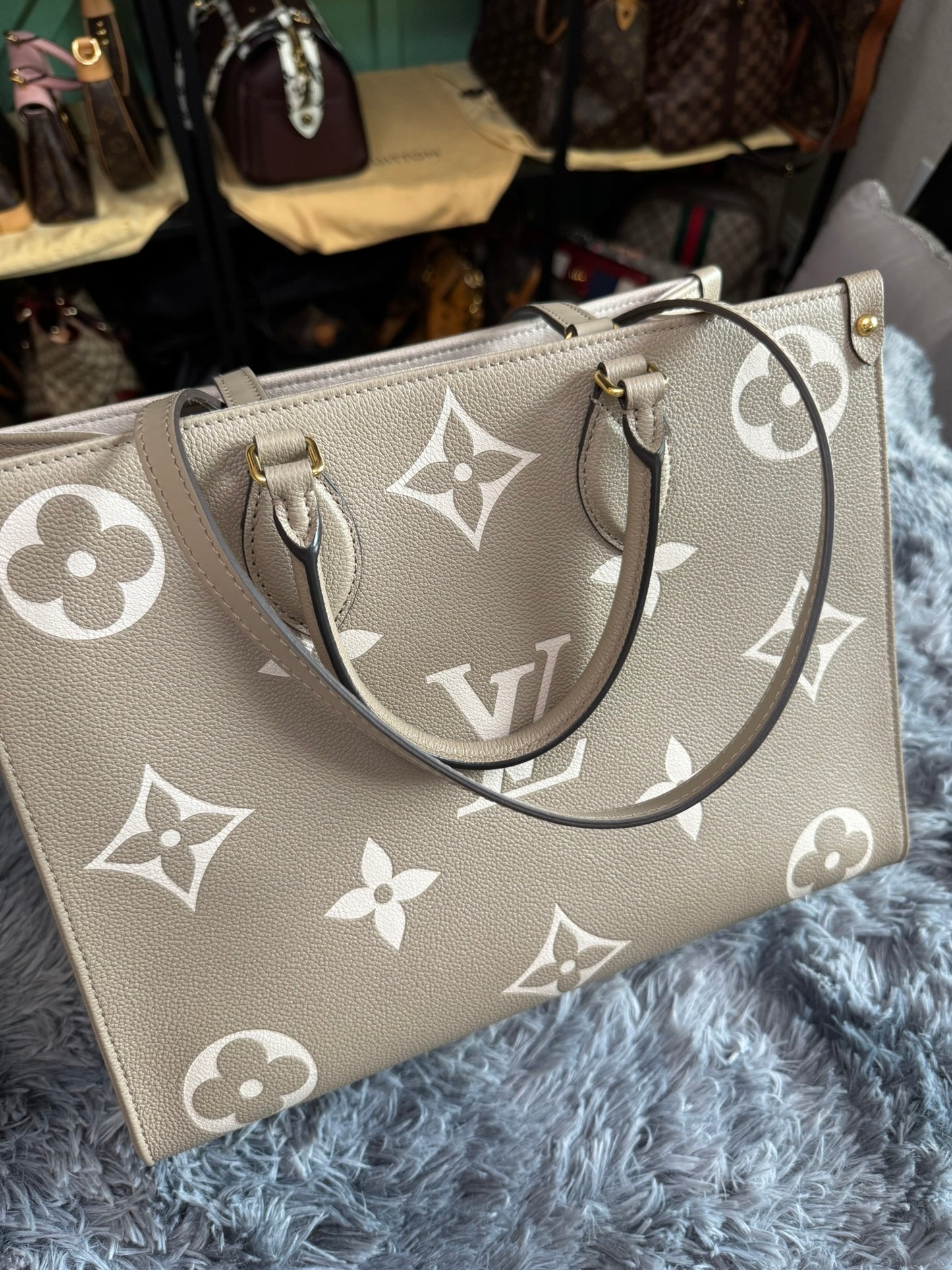 Louis Vuitton OnTheGo MM in Bicolor Monogram Empreinte Leather (Tourterelle/Cream)