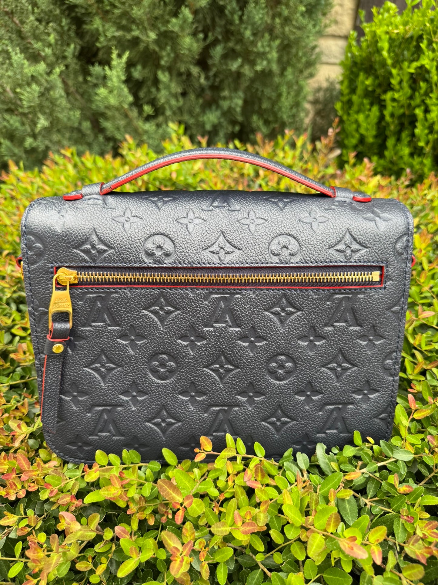 Louis Vuitton Pochette Métis in Marine Rouge Empreinte Leather