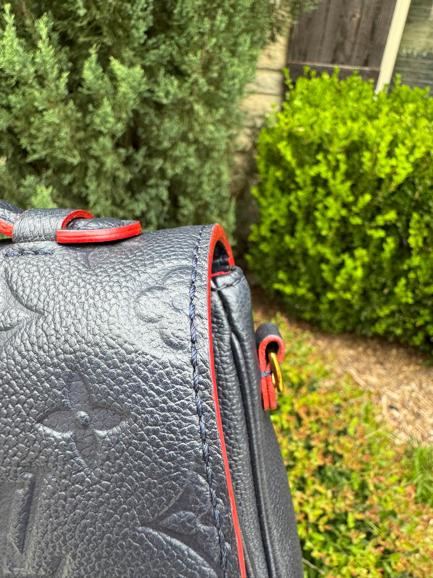 Louis Vuitton Pochette Métis in Marine Rouge Empreinte Leather