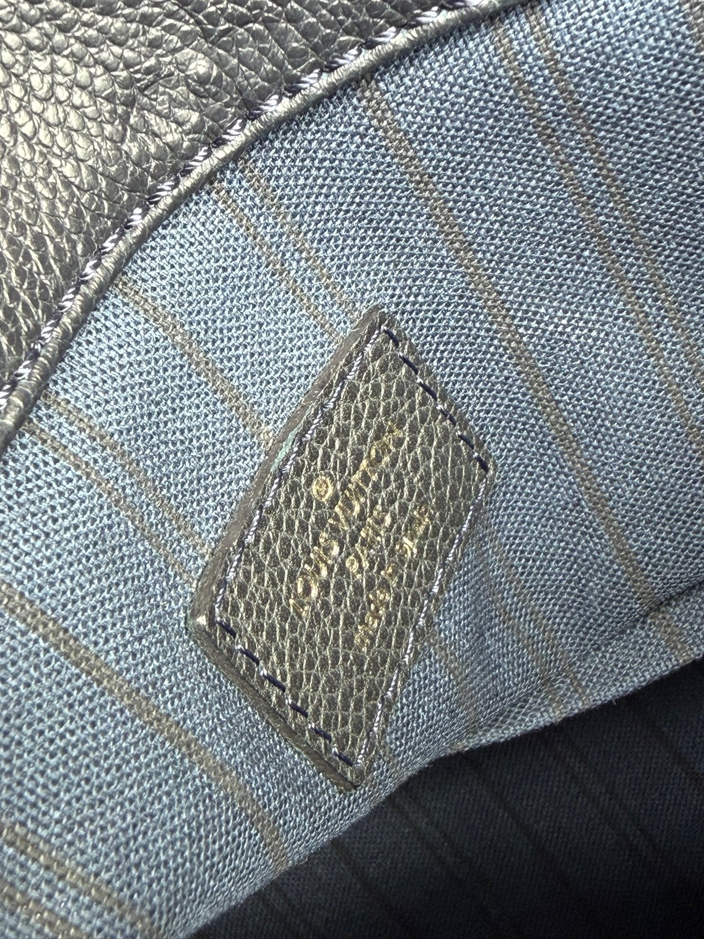Louis Vuitton Artsy MM in Infini Empreinte Leather