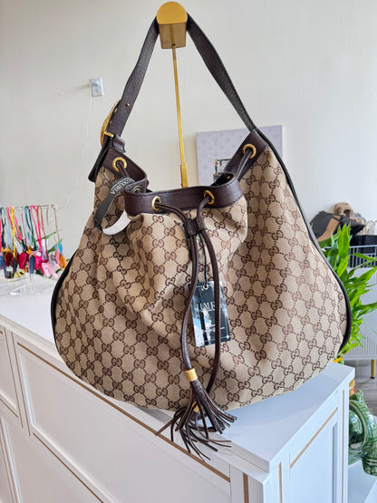 Gucci GG Drawstring Hobo Bag in Monogram Canvas