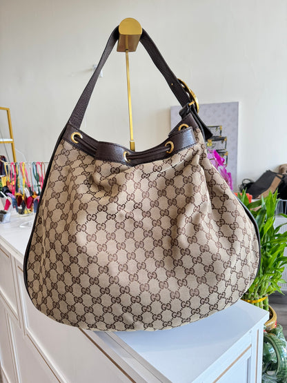 Gucci GG Drawstring Hobo Bag in Monogram Canvas