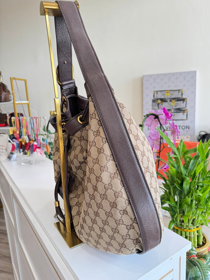 Gucci GG Drawstring Hobo Bag in Monogram Canvas