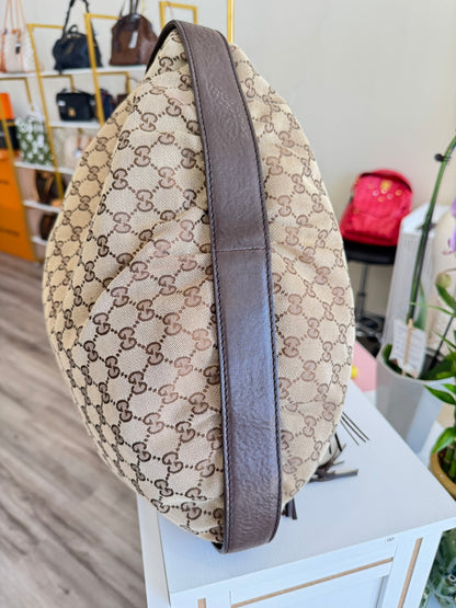 Gucci GG Drawstring Hobo Bag in Monogram Canvas