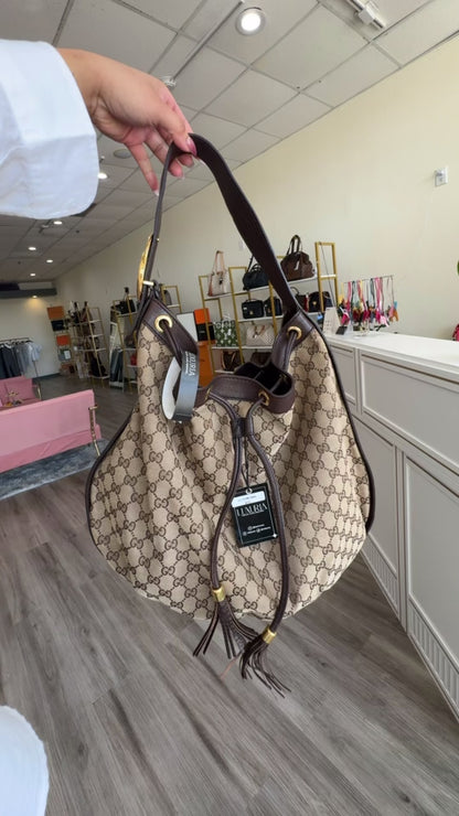 Gucci GG Drawstring Hobo Bag in Monogram Canvas