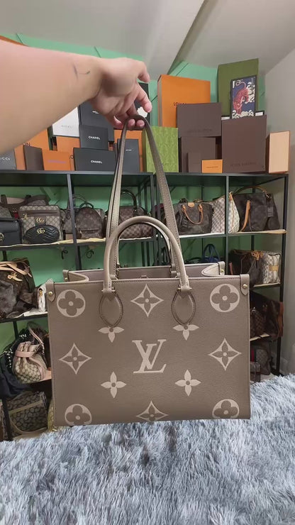Louis Vuitton OnTheGo MM in Bicolor Monogram Empreinte Leather (Tourterelle/Cream)